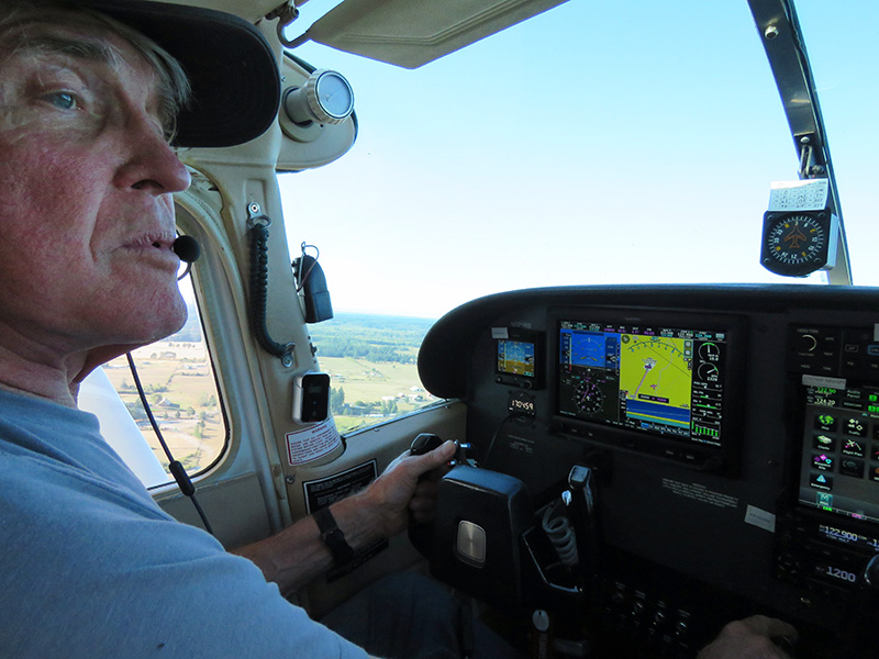Michael Messmore pilots a small aircraft.