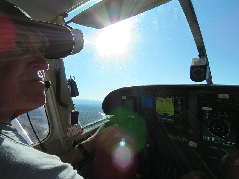 Michael Messmore pilots a small aircraft.