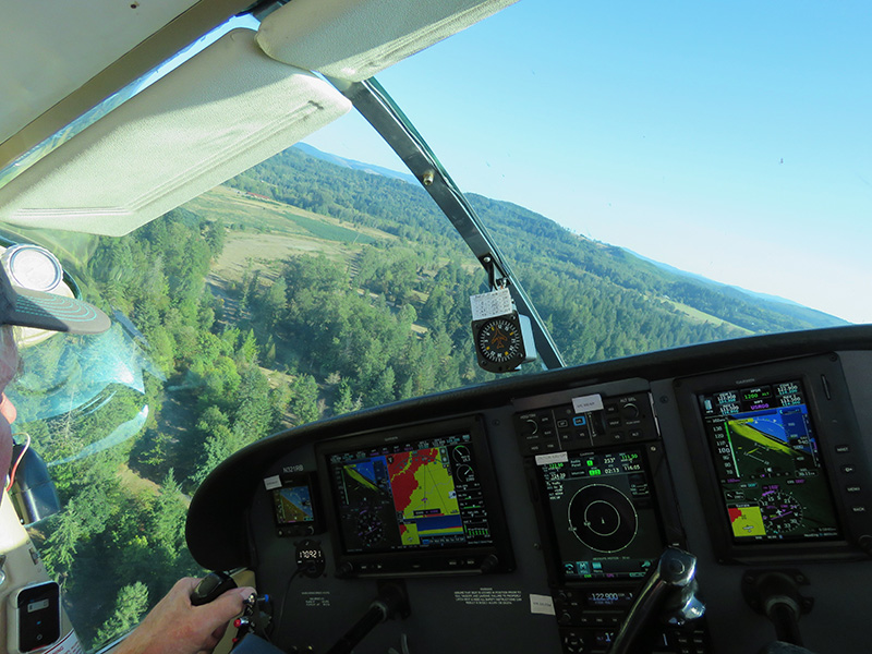 Michael Messmore pilots a small aircraft.