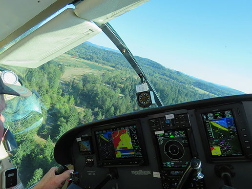Michael Messmore pilots a small aircraft.